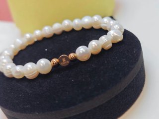 Pulsera Tous Perlas naturales y acero color rosego