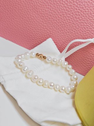 Pulsera Tous Perlas naturales y acero color rosego