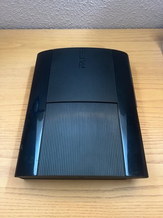 PS3 Super Slim 500GB + 2 mandos + 5 juegos