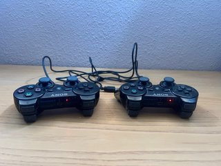 PS3 Super Slim 500GB + 2 mandos + 5 juegos