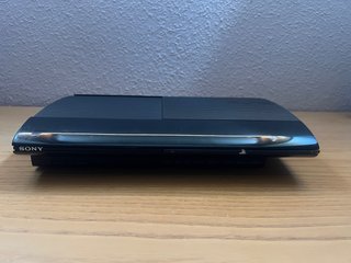 PS3 Super Slim 500GB + 2 mandos + 5 juegos