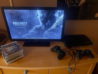 PS3 Super Slim 500GB + 2 mandos + 5 juegos