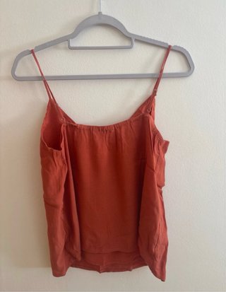 Top tirantes naranja botones
