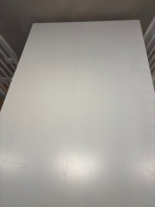 Mesa de comedor blanca con 4 sillas