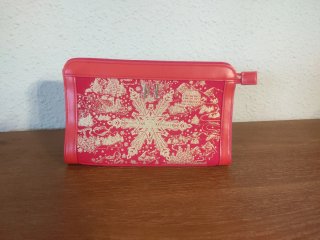 Neceser Carolina Herrera Rojo y Dorado.