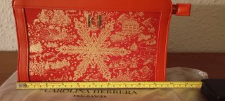 Neceser Carolina Herrera Rojo y Dorado.