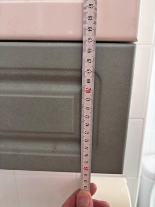 Mueble de baño blanco y verde