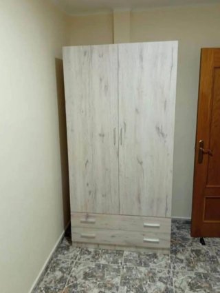 Camas y armarios