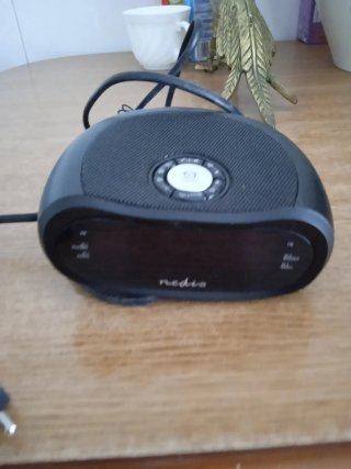 Despertador con Radio Negro