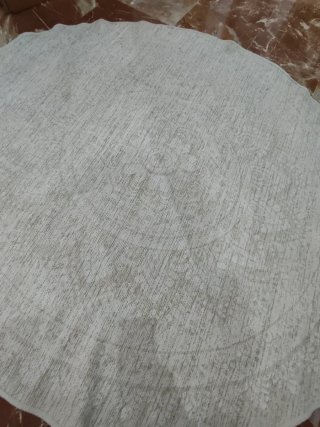 Alfombra redonda beige y gris