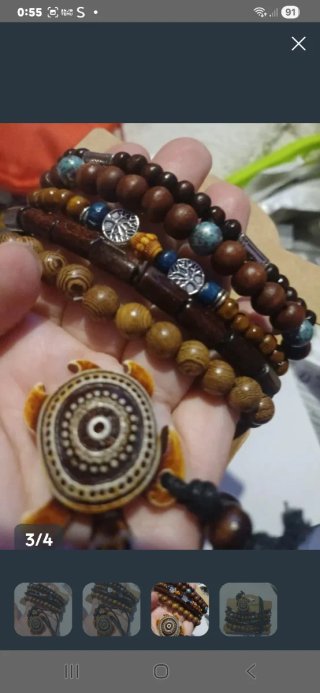 Ciondolo tartaruga e braccialetti in legno