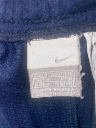 Pantaloni Nike Blu con Strisce Rosa