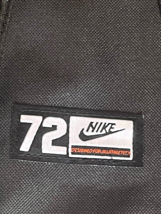 Mochila Nike Negra y Dorada