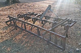 Cultivador 11 brazos con rastra labor 2,40 m.