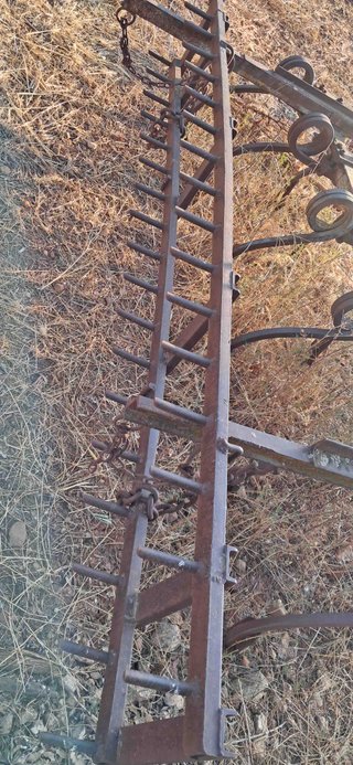 Cultivador 11 brazos con rastra labor 2,40 m.