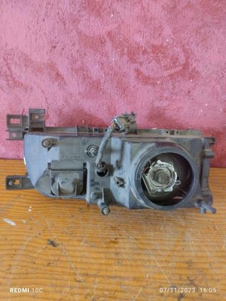 Faro izquierdo 54530178 (vym) Nissan Primera (P11