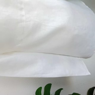 Vestitino in lino bianco con cartellino