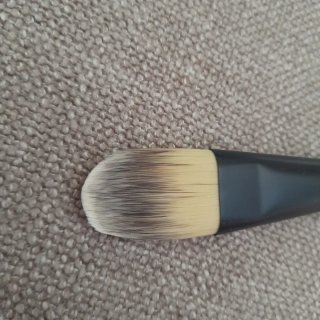 Brocha de maquillaje Lancôme Negra y Beige