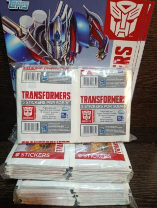 300 sobres cromos Transformers + 3 álbumes