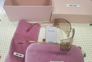 Occhiali da sole Miu Miu MU54YS