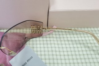 Occhiali da sole Miu Miu MU54YS