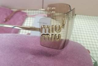 Occhiali da sole Miu Miu MU54YS