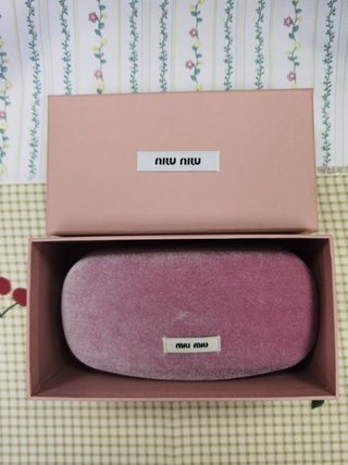 Occhiali da sole Miu Miu MU54YS