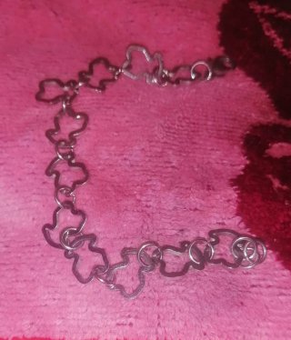 Pulsera con dijes de ositos y lazos