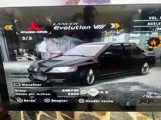 PS2 Slim Nera + 3 Giochi + Fotocamera + 4 Controller