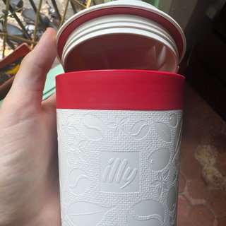 Taza de viaje illy por Zagnoli - nunca usada