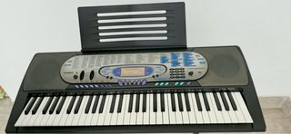 Teclado Casio CTK-571 + Soporte. Precio negociable