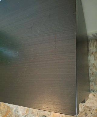 Mueble de salón de madera oscuro