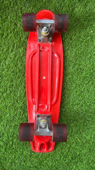 Monopatín rojo crusier fish