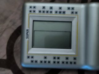 Máquina de videojuegos E-9999 Brick Game