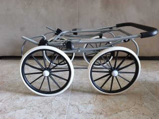 Carrito de muñecas azul con capazo extra