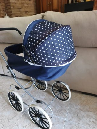 Carrito de muñecas azul con capazo extra