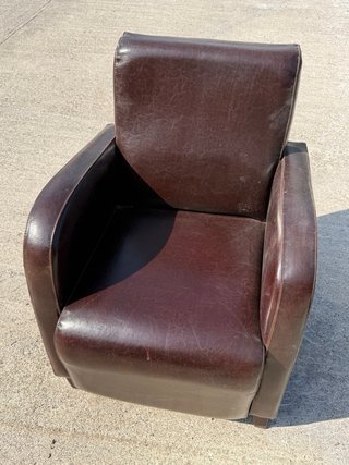 Par de butacas de cuero marrones
