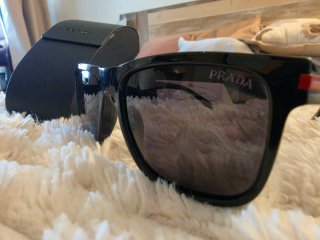 Occhiali da sole Prada neri lucidi