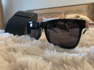 Occhiali da sole Prada neri lucidi