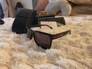 Occhiali da sole Prada neri lucidi