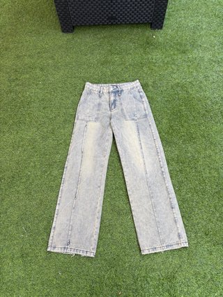 Pantalones vaqueros anchos desgastados
