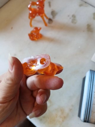 Juguetes antiguos de ciervos naranjas