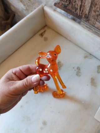Juguetes antiguos de ciervos naranjas