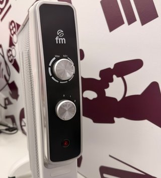 Radiador Electrico FM blanco y negro