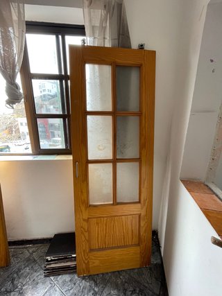 Puerta de madera con cristal corredera