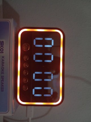 SK01 Altavoz Karaoke Reloj Despertador