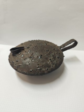 Lucerna antica in ferro