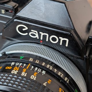 Canon AE-1 + Lente FD 50mm f/1.8 S.C.