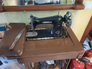 Máquina de coser antigua.Marca Singer