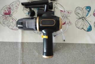 Aspirador Portátil Negro y Dorado